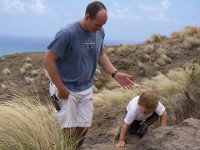 IMGP2878  Climbing up the pillbox trail in Lanikai. Sammy did a great job hiking up 1/2 mile and 500+ feet elevation. Not an easy job for a little guy. He says pirate ships, smaaaaall pirate ships, can be seen from the pillbox. He has been talking about pirates at "Waimanawo beach" (Waimanalo beach).