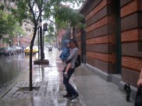IMGP4689  Mary carried Sam ALL over NYC so that she could snuggle him. Her little arms were pretty strong! Here we are dashing home in the rain.
