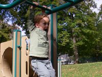 imgp5096  Then we met Connie and went to the playground to work off pancakes and eggs :) He's doing a good job hanging and getting his feet back on that platform. A new skill. He did it over and over again!