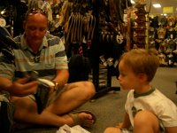 IMGP9118  Buying Sam some water socks at the Exchange for our next snorkel trip to Shark's Cove.