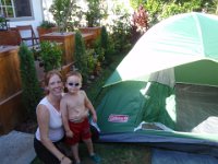 P7060002  Our new tent for Mommy and boys camp-outs (ie. without Daddy around to launch the huge two-room plus lanai tent!). I put it up in about 10 min and had Dave certify me for a solo camping trip while he's back in NY. I shrewdly invited lots of friends so maybe they'll feed us! ha ha! I love to build a fire but not necessarily for cooking, unless it's s'mores!