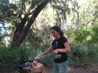 P8230160  Next shift of happy campers arrived for dinner on Sat night! This worked out well :) Here's Kathy cooking up the burgers.