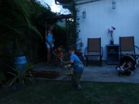 P9050010  The boys are cleaning up after the ball game :) Just like at a real game! I served hot dogs, pretzels, popcorn and other random foods - Liisa's husband is away and Dave was working late so we decided to let the boys have at it with all the balls and toys.