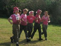 IMG 0850  Here we are, linked up to cross together! It's been 5.2 miles of mud, slog, water up to our waists, enormous sink holes (Michelle is so light that she could just skirt across the tall grass without sinking in like the rest of us!). So here's me, Michelle, Sue, Amy, Cathi and Kathy. You will see what a trooper Kathy was later...