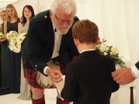 2009-04-25Wedding (32)  Chief of Skene, Danus Moncrief Skene, collecting the rings from Sam.