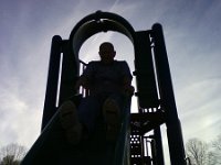 ATT00190  Dad coming down a very narrow slide.