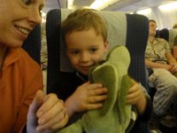 P4140009  Turtle is happy to be flying! (See sleepy Marines in the background? These guys just sleep and sleep and sleep on the plane.)