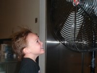P4210007  We needed to cool down after the security exercise - you all know the drill. Sam is cooling off with the huge fan!