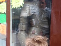 P4240114  Checking out a knight in shining armour. I like seeing Daddy in the reflection, too. (See the bedhead?)