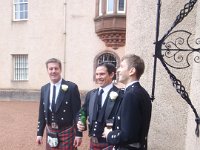 P4250174  Robb and Doug are Skenes, wearing their clan tartan. The other guys rented tartans at a Highland wear store. It is apparently considered an honor to don a clan's tartan, even if you aren't a member.