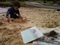 ATT01339  We stopped midway through a run to go for a swim. Ben was asleep in the stroller, so we also had some time to do watercolor paints with ocean water and limu for brushes. Sam's picture turned out way better than mine! We had such a great time.