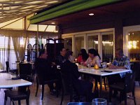 IMGP0213  Here's the inside of the restaurant. You're sitting outside, listening to the water feature in a very relaxed but upscale setting. The new camera's panorama feature stitches the images together as you take them! Wow.