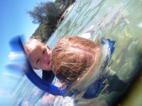 IMGP0621  Ben learning to ride on mommy for snorkeling time. He likes to steer me :)