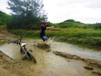 IMGP0888  This puddle we named "Tar Pit" puddle - look at the bike. The mud is SO thick you can't pull it out, nor does the bike fall over. We decided to just play in it!