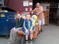 IMAG1991  They were going so nuts at Bay Hay while Dave and his mom were trying to find some plants that I put them to work with my buddy Ed at the feed section. They easily hauled a 40 lb bag off the shelf and onto the cart to wait for the customer to pull up. Then they carried it to her truck. They LOVED the work.