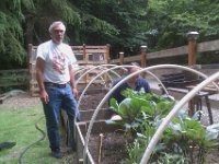 IMAG1994  Chicken-proofing the garden before Tour de Coop! They did a great job.