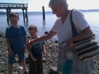 IMAG2041  At a road end with Nana, checking out crabs. She used to look under rocks as a kid, too.