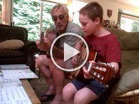 VIDEO0136  Sam and PopPop practicing guitar.