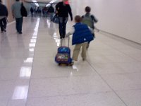 Pic-11232012-006  At LAX. Ben was skipping Gangnam-style very fast with his rolling pack, nearly taking people out.