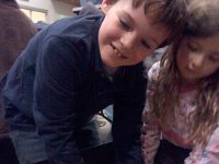 Pic-02082013-013  Sam holding Sunny - he was very gentle and told the other kids not to badger it and be rough with it.