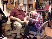 20140410 185935  At guitar practice. Sam is just really dialing in his skills lately. It's amazing to watch him pick up a piece so quickly.