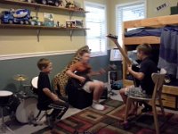 20140813 131047  Sam has a friend over who also enjoys playing the guitar.