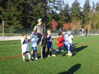 20141115 095354  The last soccer game. Ben had an epic game - he was organizing plays just before kicking the ball in by faking out the other team to move to the right side of the field then he'd kick it down the left side to a teammate. He also managed to score a goal from a corner kick!