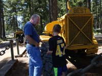 DSC02295  Picnic stop on the way to the trailhead. Richard is explaining this tractor to Ben. He is so nice!