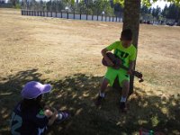 20150629 162211  Ben practicing his ukulele at the park during Sam's roller hockey practice.