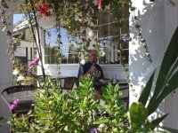 20150819 100634  Larry hiding out to work.