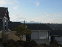 20151024 164128  Saying Fair Winds and Following Seas to Matt in Poulsbo before he heads off to Afghanistan. You can actually see where we were right above the little chimney on this garage, in the middle of the photo. That's Mt. T, then lower to the right is Mt. Zion.